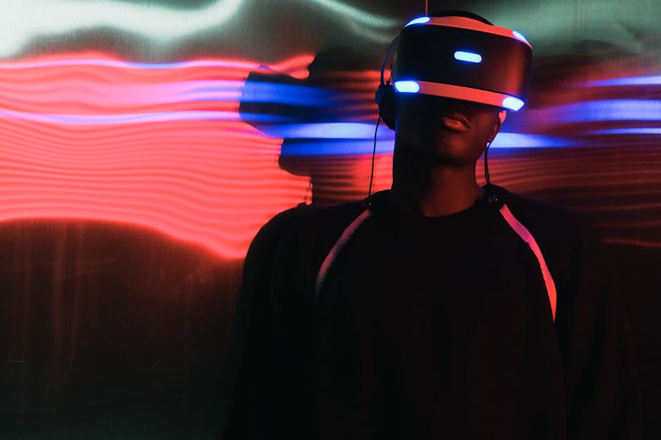A person wearing virtual reality headset surrounded by colorful neon lights, enjoying a digital world